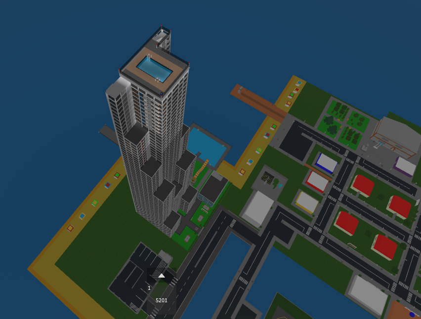 Picture of a skyscraper surrounded by a city