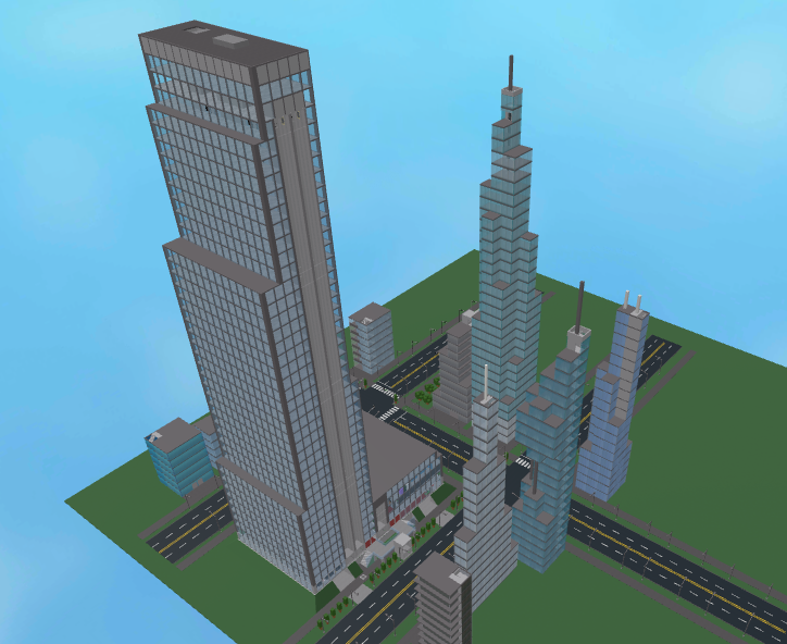 Picture of a skyscraper surrounded by a city